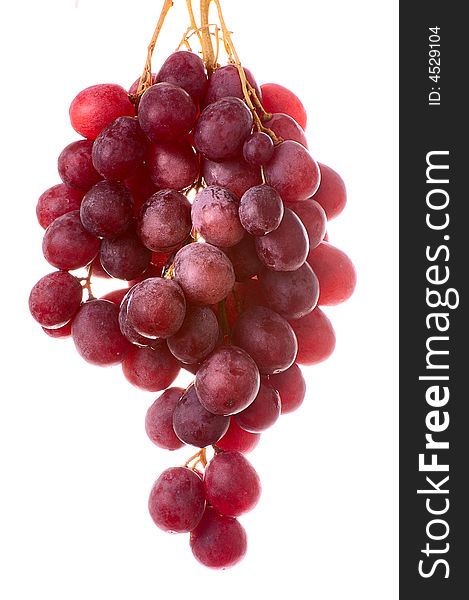 Bunch of  red cardinal grapes isolated on white. Bunch of  red cardinal grapes isolated on white