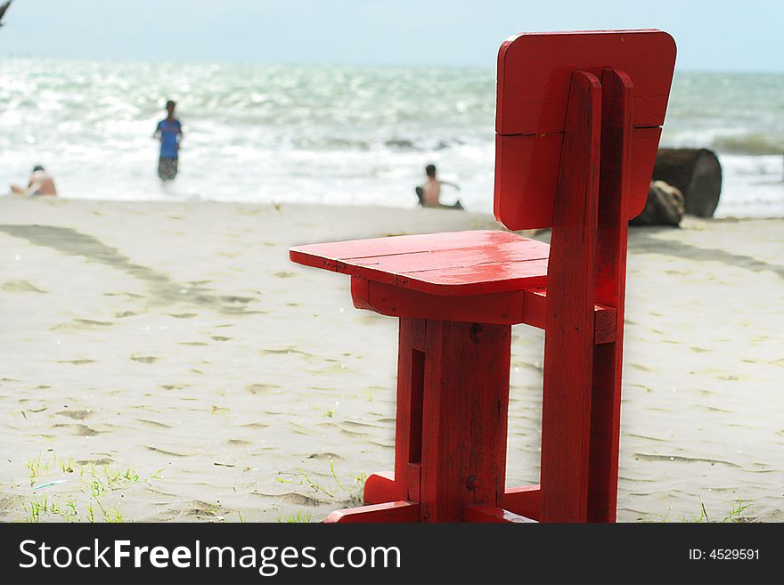 Single chair on the beach