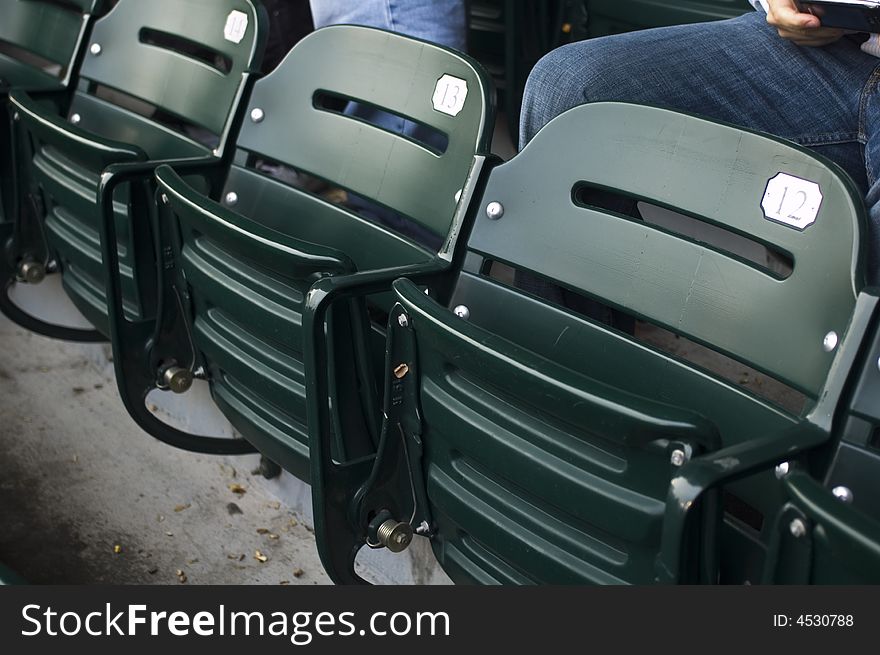 Looking at green stadium seats at the ball park