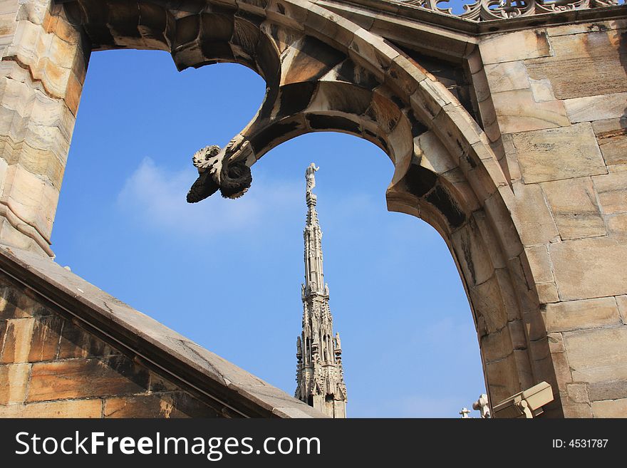 Architecture details of Milan cathedral with blue sky