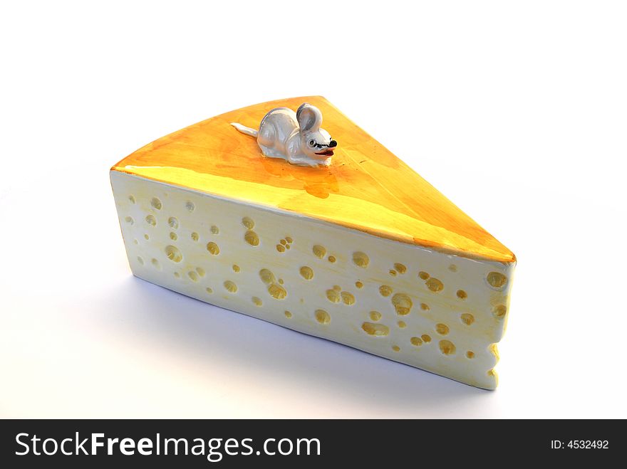 A cheese holder with a mouse as handle