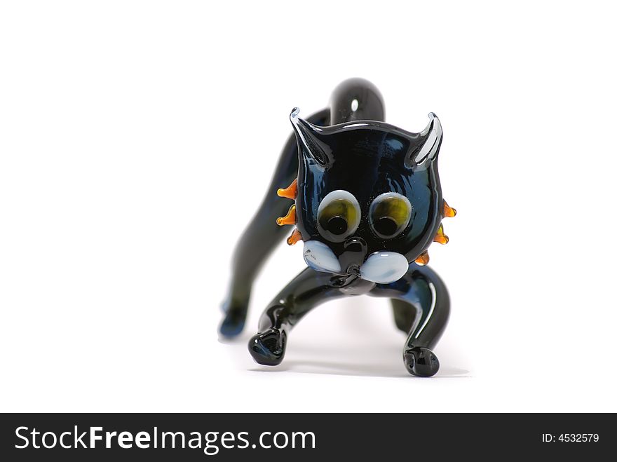 Black cowering and anry cat on white background. Black cowering and anry cat on white background