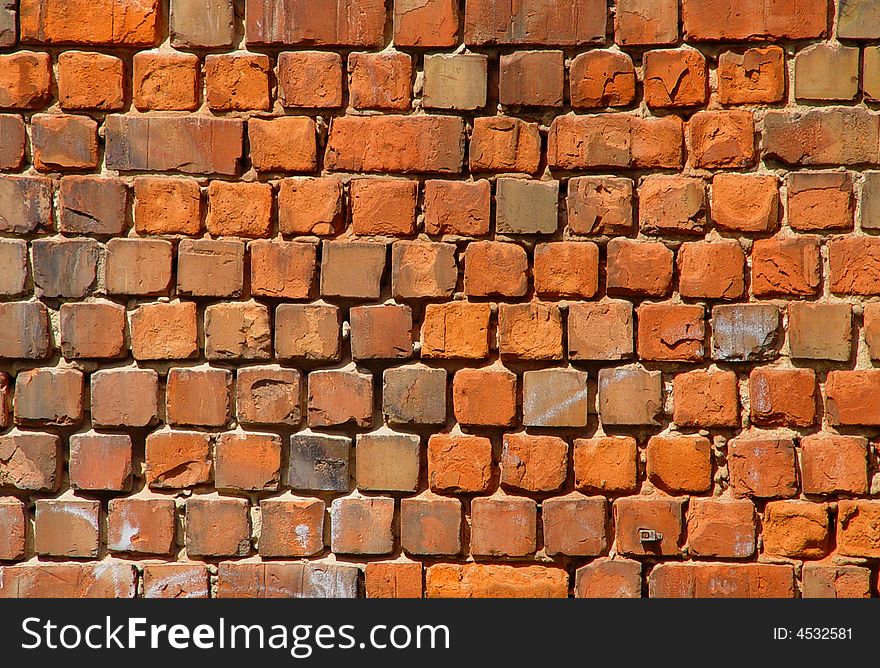 An old brick and mortar wall for backgrounds or texture. An old brick and mortar wall for backgrounds or texture