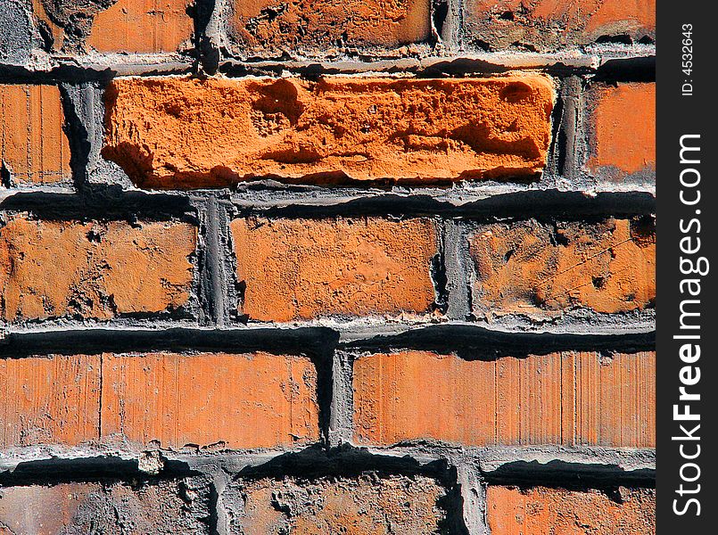 An old brick and mortar wall for backgrounds or texture. An old brick and mortar wall for backgrounds or texture
