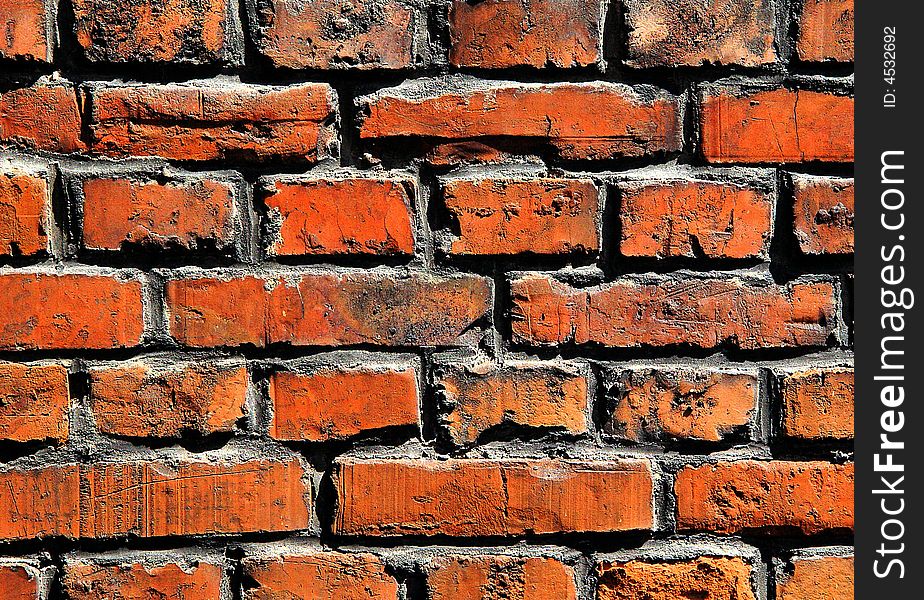 An old brick and mortar wall for backgrounds or texture. An old brick and mortar wall for backgrounds or texture