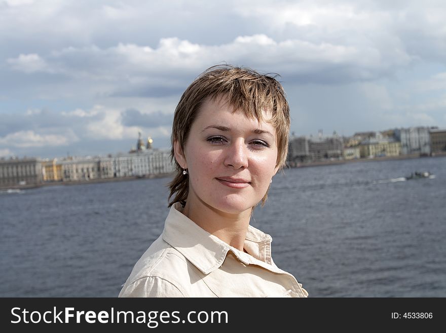 Portrait of the woman on the Neva background. Portrait of the woman on the Neva background