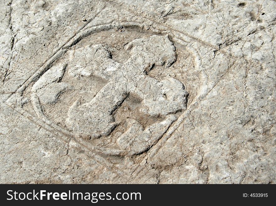 Roman cross at marble wall in Roman Bath - Ankara, Turkey