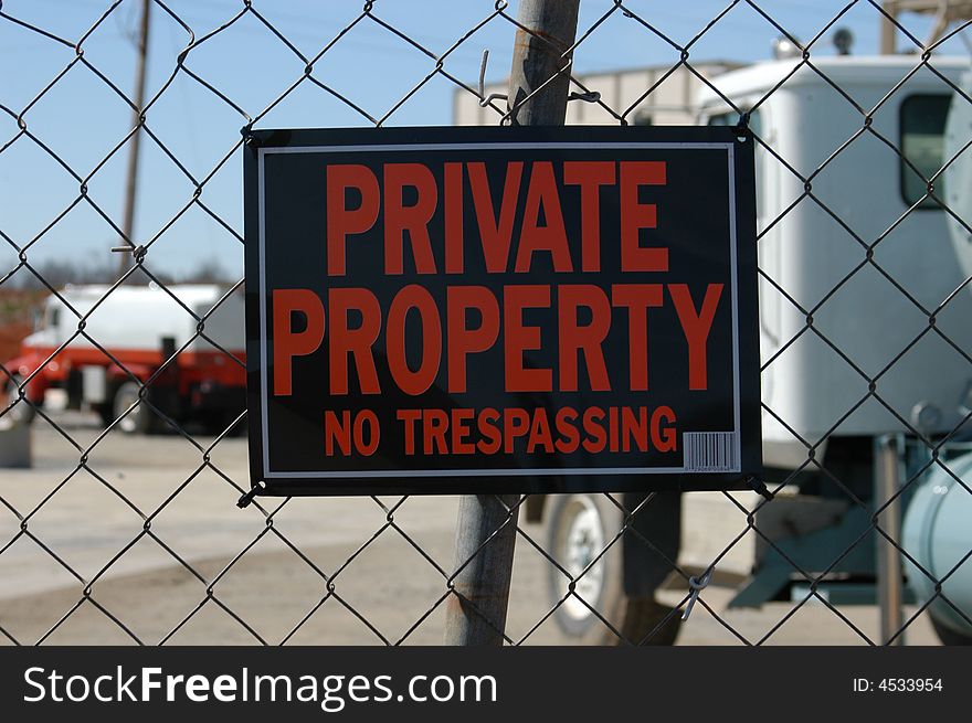 A private property sign on a construction site