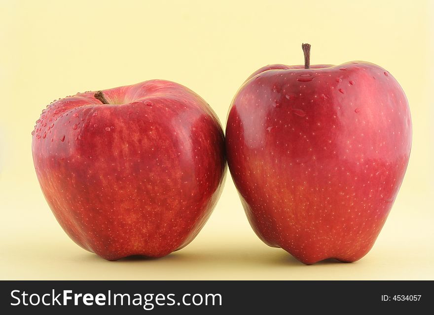 Great Red Apples on yellow background