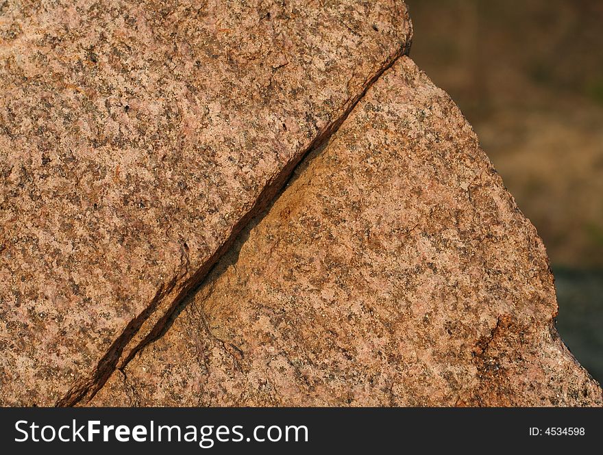 Natural granite rock that looks like an old man's face in a profile.