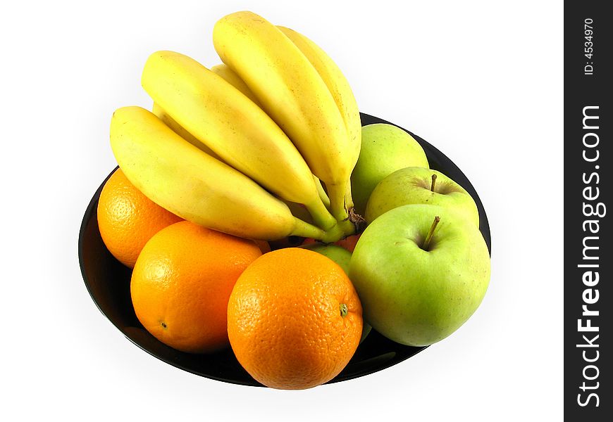 Fruit: Appples, oranges, bananas in black dish isolated on white background