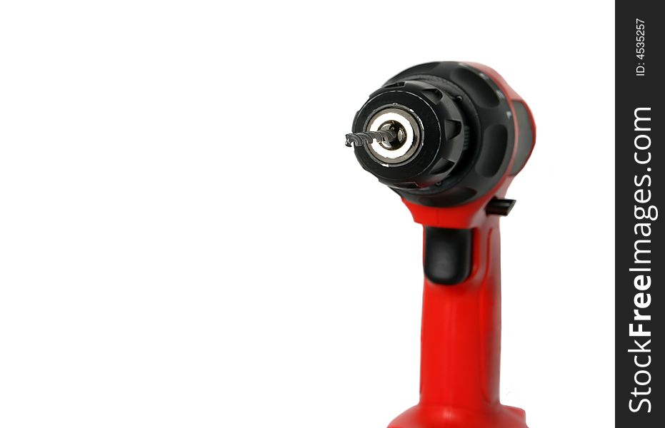 Closeup of a red drill with bit. Closeup of a red drill with bit