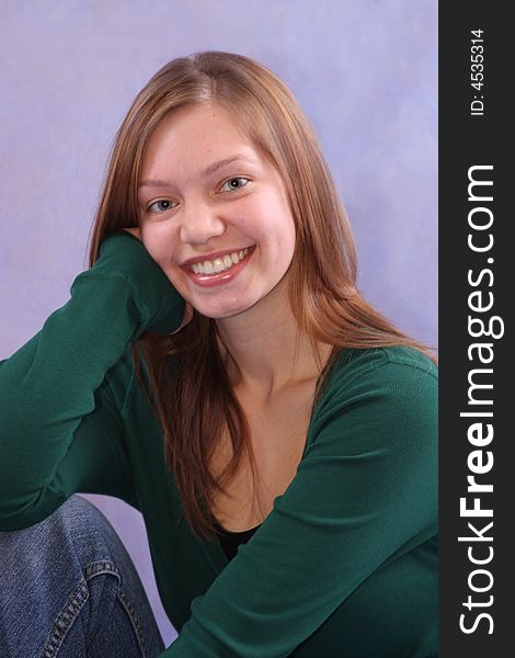 A portrait of a casual girl in a green shirt