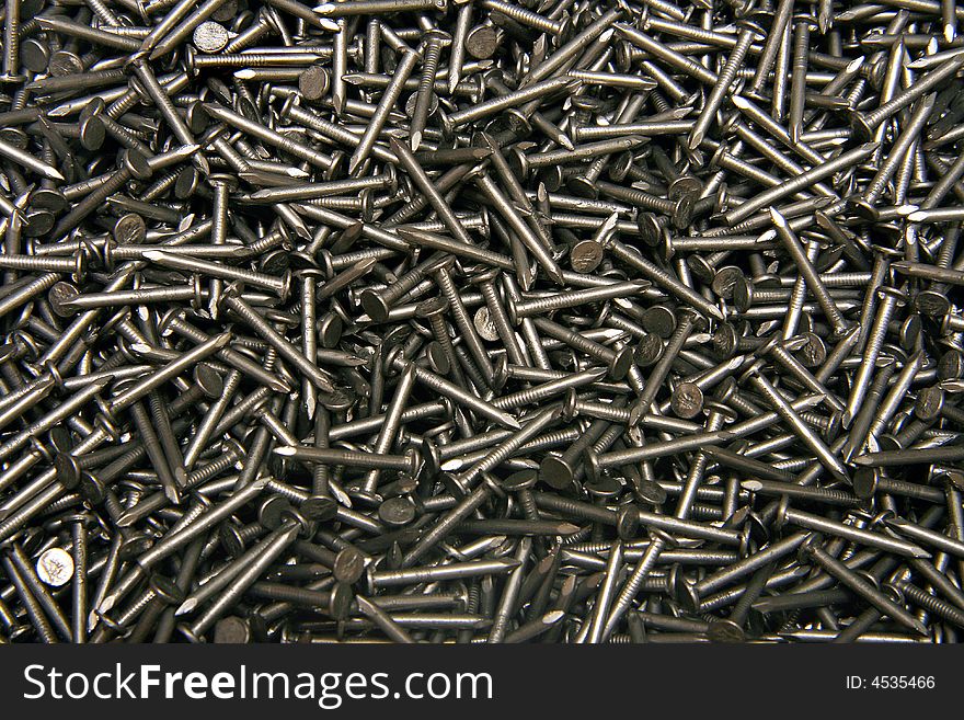 Background from sharp grey metal nails