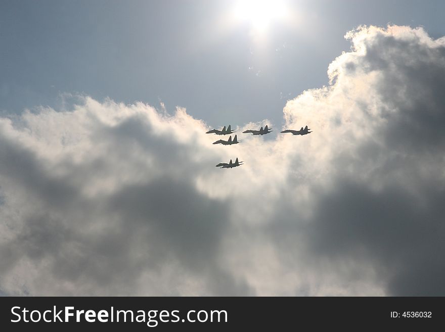 Five Russian military planes in beams of the sun. Five Russian military planes in beams of the sun