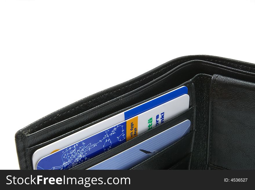 Close view of black wallet with several credit cards isolated on white