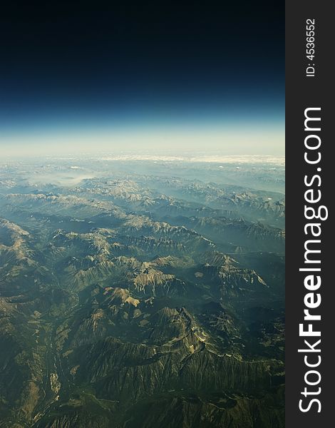 The Canadian Rockies seen from an airplane window. The Canadian Rockies seen from an airplane window.