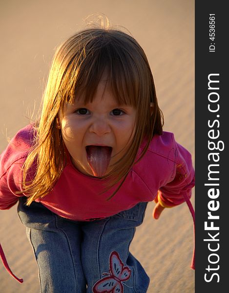 Little Girl shouting at the camera.