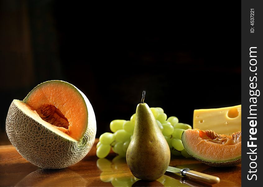Fresh fruits on table with knife. Fresh fruits on table with knife