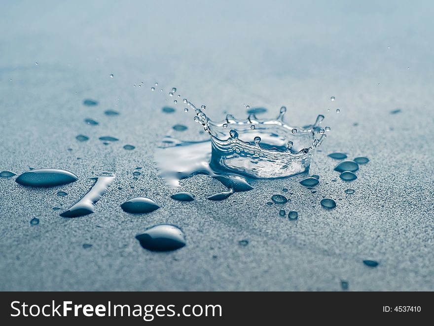 Water drop splash crown in blue tones. Water drop splash crown in blue tones