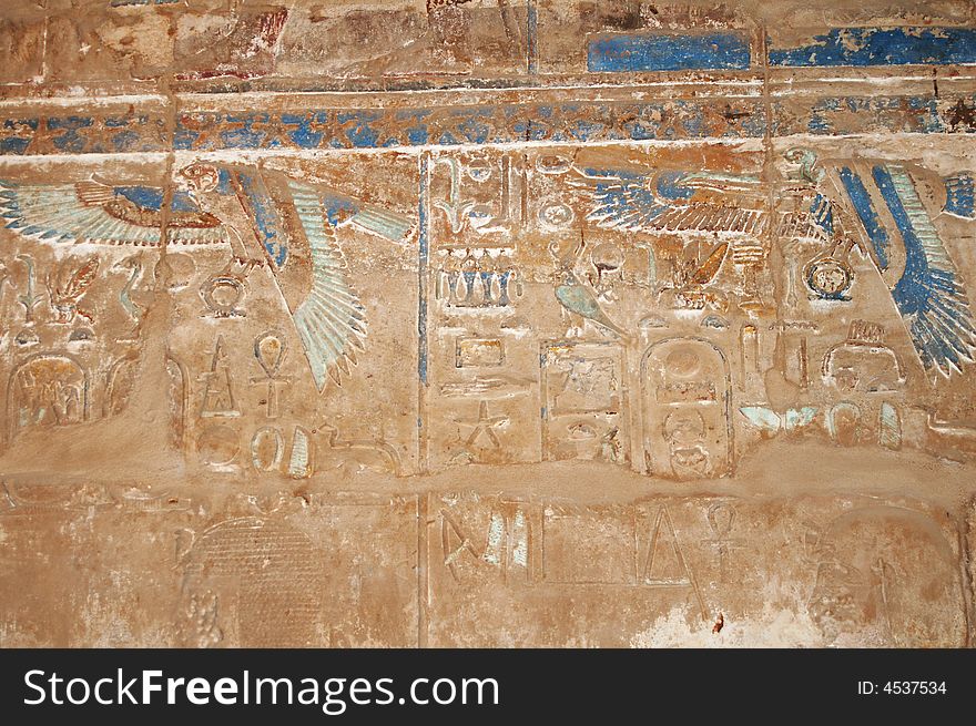 Egyptian signs on the walls of Karnak's Temple