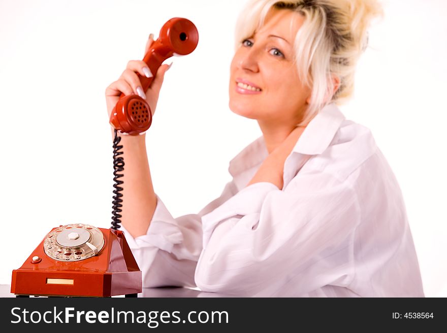 Blond caucasian model with red phone over white