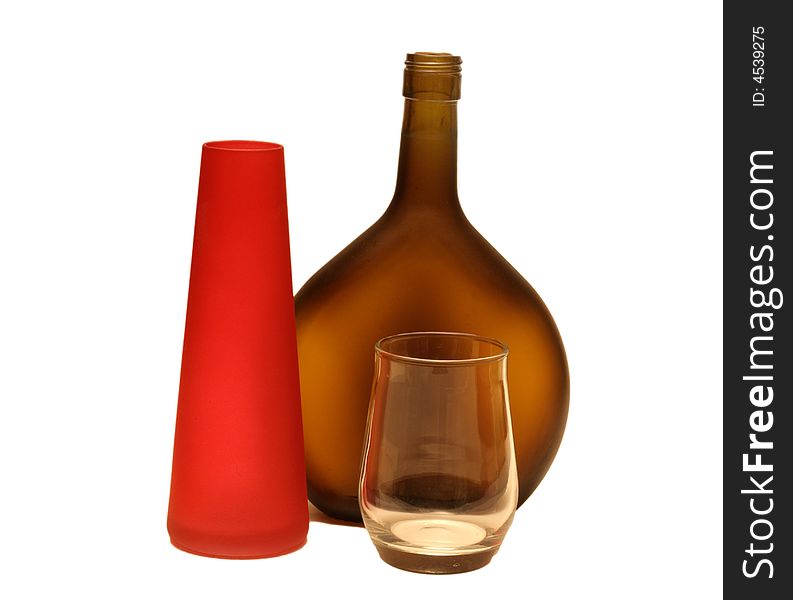 Brown wine bottle and glass isolated on a white background