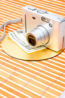 Us Money And Digital Photo Camera Royalty Free Stock Photo