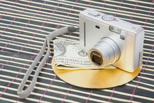 Us Money And Digital Photo Camera Stock Photography