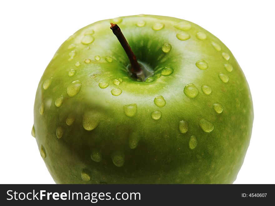 Green apple with water drops  isolated