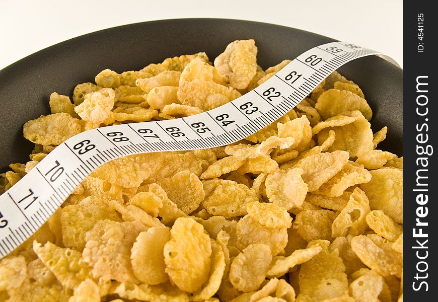 Corn flakes breakfast with measure