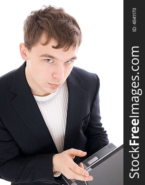 The young businessman with the laptop isolated on a white background