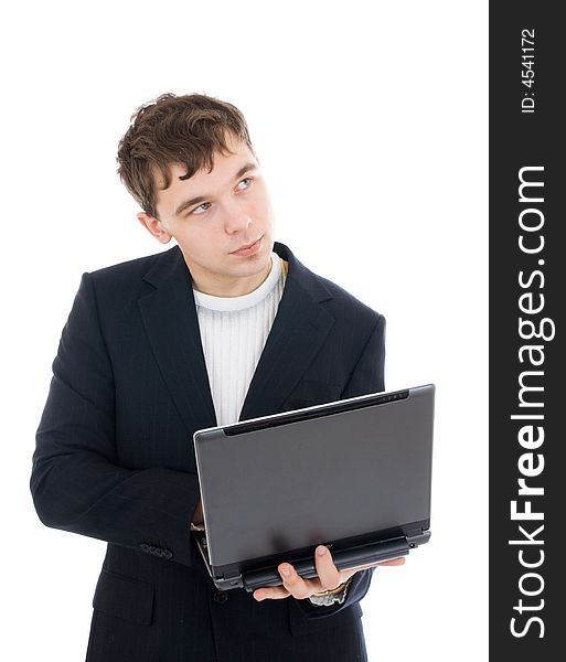 The young businessman with the laptop isolated on a white background