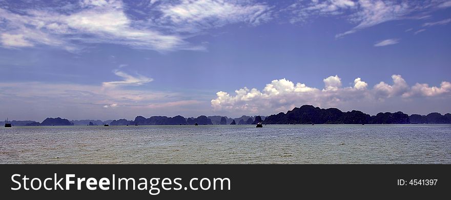 Vietnam: Halong bay with a typical asian sky