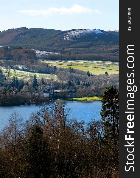 A Scottish castle at the side of a loch. A Scottish castle at the side of a loch