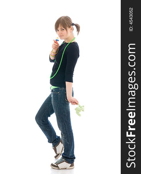 The young amusing girl with a dummy isolated on a white background