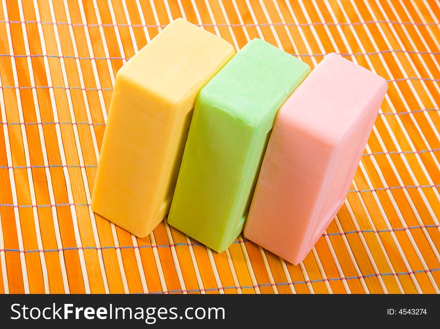 Close-up of soap on the bamboo table-cloth