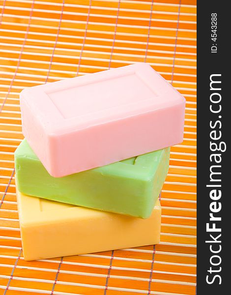 Soap on the bamboo table-cloth