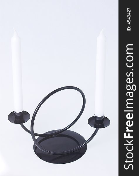 Black steel wound candleholder in simple, modern style