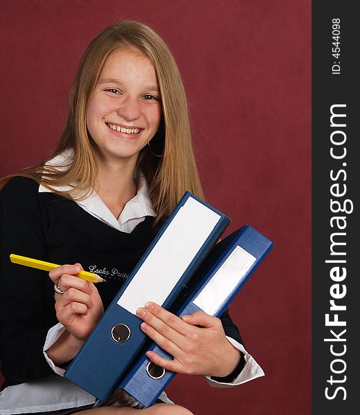 young business women whis folders and pencil