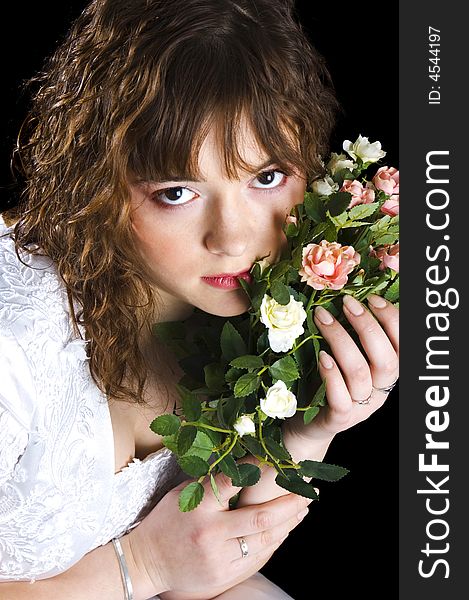 Bride with a bouquet of roses