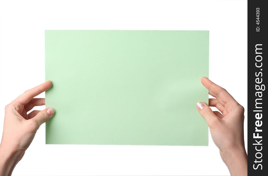 Hands hold a green leaf for advertising on a white background. Hands hold a green leaf for advertising on a white background