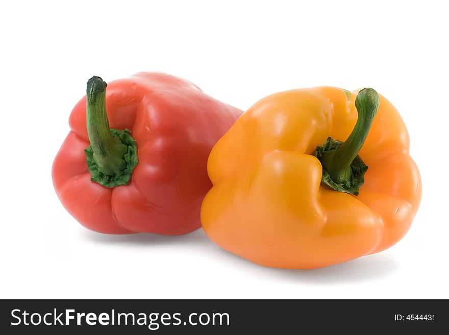 Red and yellow bulgarian pepper isolated on white background