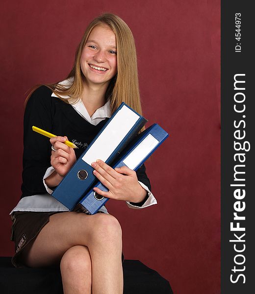 young business women whis folders and pencil