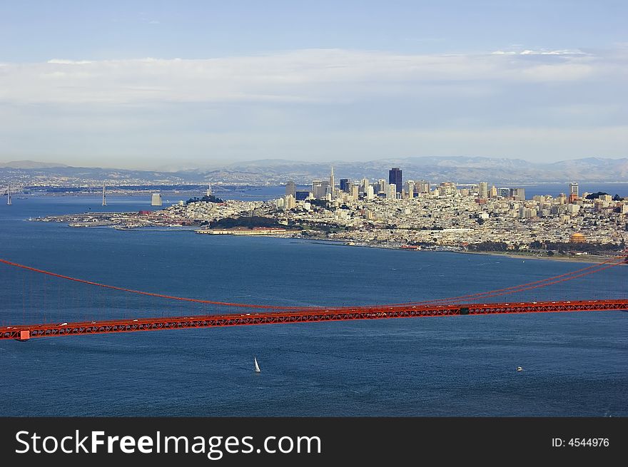 Golden Gate Bridge and San Francisco with cloudy skies
