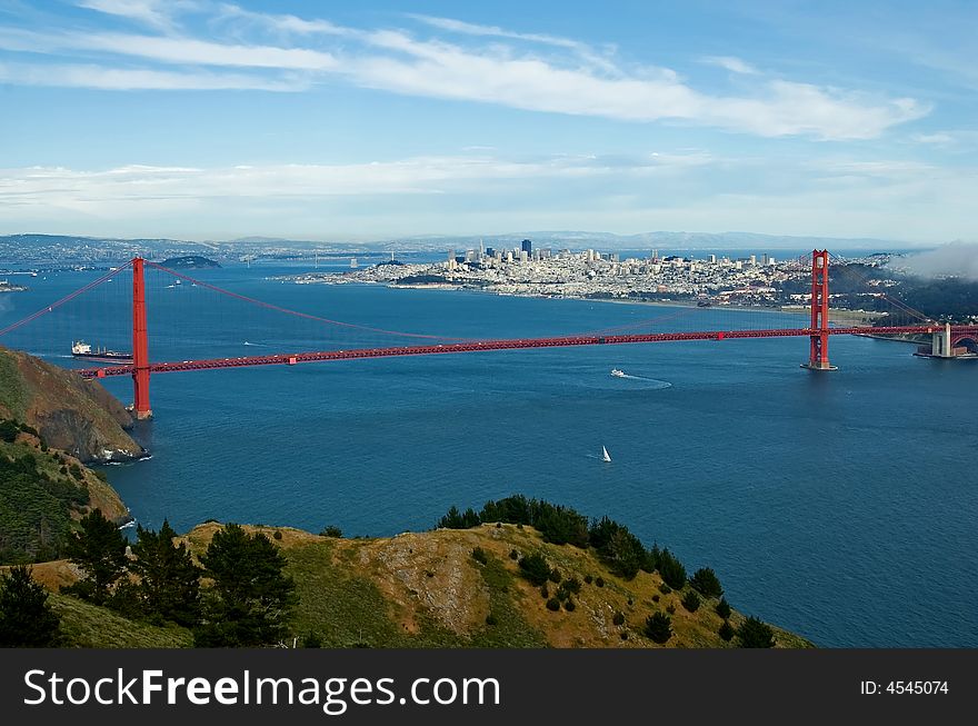 Golden Gate Bridge and San Francisco with cloudy skies