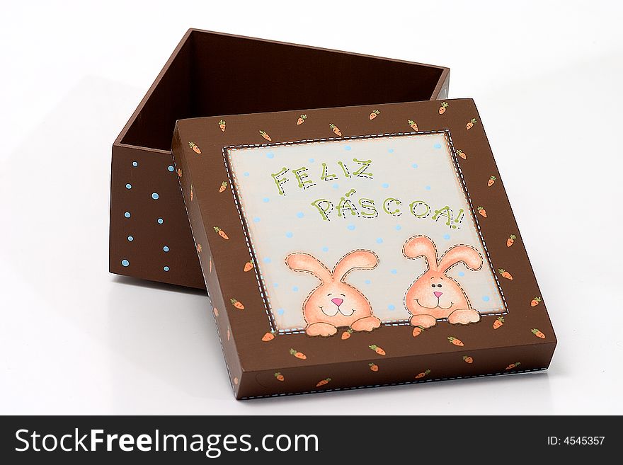 A Handmade brown box, with orange carrots painted, and two rabbits on cover. A Handmade brown box, with orange carrots painted, and two rabbits on cover