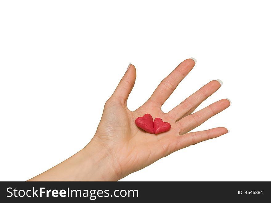 Two red hearts in the hand
