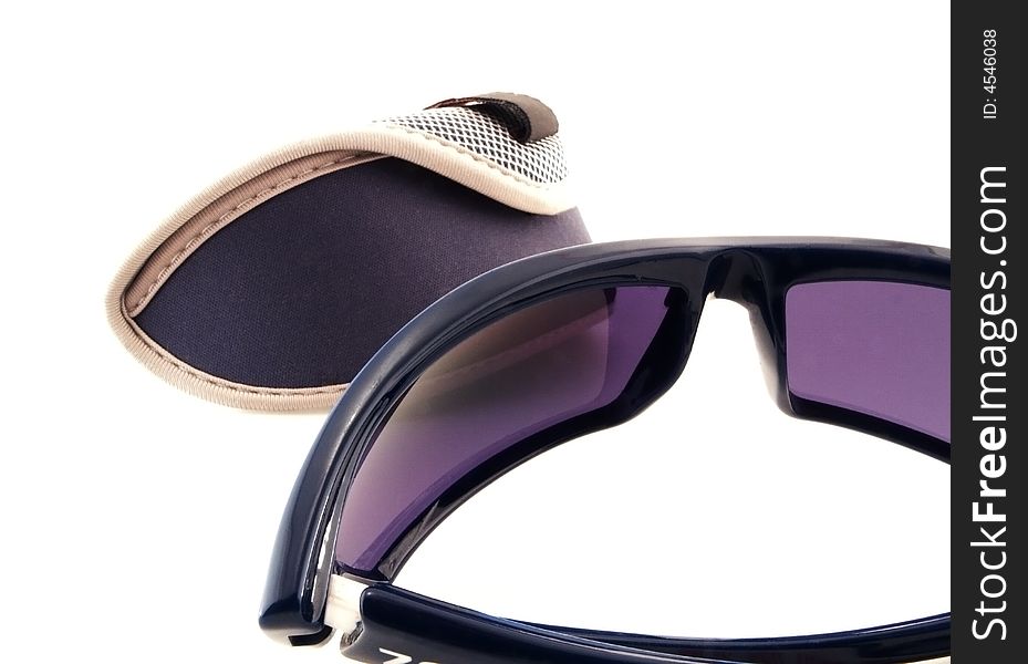 Close-up photo of blue sunglasses with case. Close-up photo of blue sunglasses with case