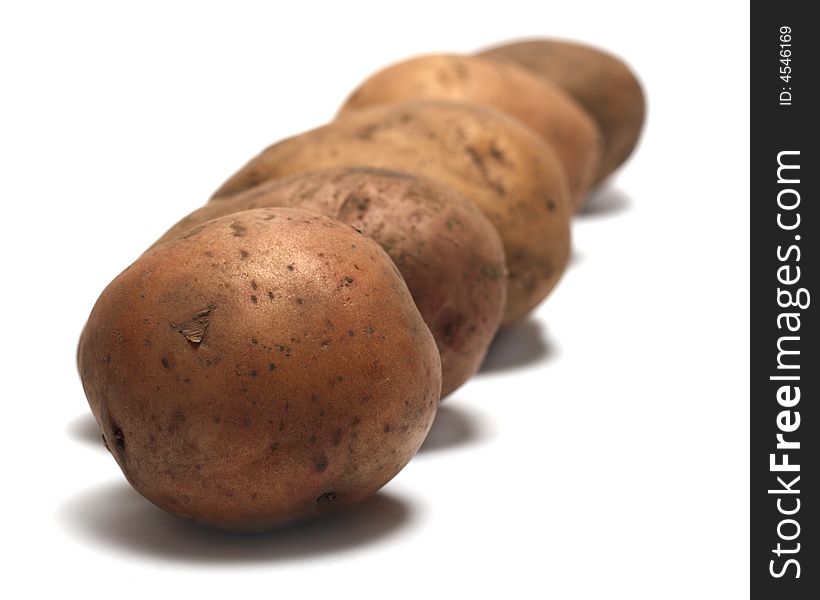 Row Of Organic Raw Potatoes